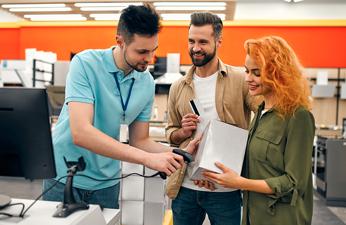 Retail POS and inventory tools for unified checkout and loyalty management Retail checkout with touchscreen POS and barcode scanner in modern store